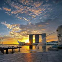 
                    
                        Sun setting over Singapore, a great exotic escape. Photo courtesy of jerricatan on Instagram.
                    
                