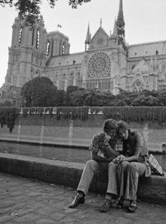 
                    
                        A couple embraces in front of the Notre Dame, Ile-de-France, 1970
                    
                