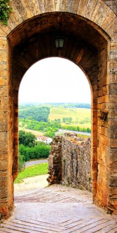 
                    
                        Ancient Defensive Gate of a Beautiful Village in Tuscany, Italy   |    15 Most Colorful Shots of Italy
                    
                