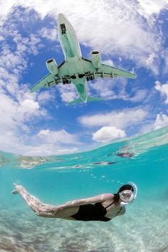 
                    
                        Amazing series of photos >> People swimming with planes overhead. This photo is making me ache to be somewhere warm more that usual!!!
                    
                