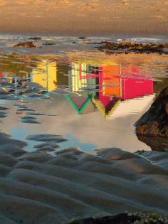 
                    
                        I'd like to blow this up & hang it on the wall :) love the color, the beach & the upside down of this. Fits me :)Beach hut reflections.
                    
                