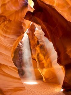 
                    
                        Sunlight Streams Through Cracks in a Slot Canyon | Beautiful prints of the world's most stunning places!
                    
                