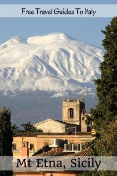 
                    
                        The snow capped volcano of Mount Etna, on the Italian Island of Sicily, as seen from Taormina | Free travel guides to Sicily and the rest of Italy.
                    
                