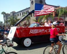 
                    
                        Best American Beach Towns for Fourth of July: Fourth of July parade, Huntington Beach, California. Coastalliving.com
                    
                