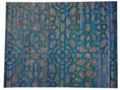 
                    
                        A lovely rug, integrating a dull silver amid a sea of luminous blues.--CH
                    
                