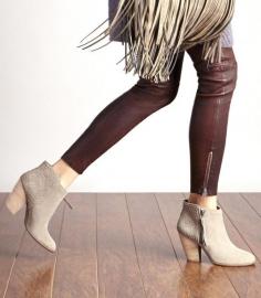 
                    
                        Neutral suede booties by Sole Society
                    
                