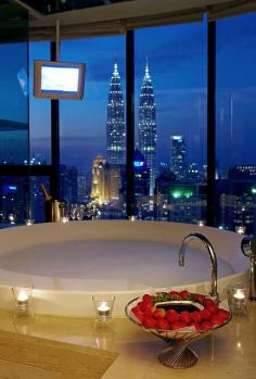 Luxe bath tub with a city view!