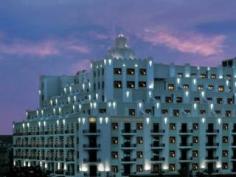 Visited by many celebrities and movie stars, this magnificent first class hotel enjoys a central location in Shanghai, right at People's Square and in the city's central business district, offering a perfect base for business travellers as well as for tourists. The establishment is only 30 m from the metro line 1/2/8 and many local attractions are easy reachable within walking distance. Guests will be impressed by the beautiful lavish decoration of the hotel's rooms and suites, which feature high quality bedding and advanced facilities. From exquisite regional cuisine to authentic Italian and Mediterranean dishes, the hotel's sensational restaurants will take guests to a unique culinary experience. The accommodation has also perfect event and meeting facilities as well as a fantastic spa area, where travellers can relax after a long day of work or sightseeing.
