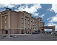 what's in a name? welcome to the Hampton Inn-Defiance Named after a Revolutionary War-era fort that stood on the banks of the Maumee River in northwestern Ohio, the city of Defiance is not as unruly as its name might imply. It has, in fact, been consistently ranked in recent years as one of the top 100 small towns in America. A proud, hard-working Midwestern town by tradition, Defiance is proud of its history and has an eye on its future. Visit the Hampton Inn Defiance and discover life in the heart of the heartland. Travel back in time and imagine a simpler life at AuGlaize Village, a community of dozens of new, restored and reconstructed buildings that represent day-to-day existence in and around Defiance from the mid 1800's to approximately 1920. The fascinating village is located just minutes from our hotel in Defiance. Pack a picnic lunch and enjoy a sun-drenched afternoon at Fort Defiance Park. It was the fort on these grounds that inspired the city's name. Pick up something special for that special someone at the shops in the historic downtown shopping district or at Northtowne Mall, filled with all of your favorite stores and brands. Visit our hotel in Defiance in Spring and celebrate with local revelers at the annual Lilac Festival. Arts, crafts and food vendors line the streets and music fills the air as the city honors its tradition-rich past. So, what's in a name, anyway? Visit our hotel in Defiance and discover that this town is anything but. services & amenities Here at the Hampton Inn Defiance, we're passionate about taking good care of you. That's why we offer a broad range of services and amenities to make your stay exceptional. Whether you're planning a corporate meeting or need accommodations for a family reunion or your child's sporting group, we're delighted to offer you easy planning and booking tools to make the process quick and organized * Meetings & Events * Local Restaurant Guid