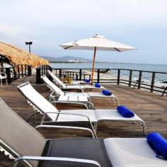 This modern hotel is perched right by the sea and just a two-minute walk from the beach at Punta de Caiman. The historic city centre of Santa Marta is only a half-hour drive away, and the Quinta de San Pedro Alejandrino, the celebrated villa of Simon Bolivar, is just 15 kilometres away. The hotel's comfortable rooms range from double to quintuple to suit up to five guests. Each room is air-conditioned and en suite, featuring a laptop-compatible safe, LCD TV, and simple, unpretentious décor which is perfect for a relaxing seaside holiday. Business travellers might make use of the business centre and events room, and everyone can enjoy the outdoor pool and children's pool, free wireless internet access in public spaces, and a daily complimentary breakfast. There is also a rooftop terrace, multilingual staff in the 24-hour reception and a roundtrip airport shuttle for added comfort.