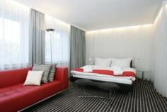 This hotel is located in a peaceful setting near to a church just 50 metres away from the Josephinium bus station. The city centre, with its shops, is just a 20-minute walk away or 7 minutes by car. Beethoven's birthplace and the River Rhine are also within easy walking distance and the Rheinauen Park is a 15-minute drive from the hotel. It is 12km to the Siebengebirge and 25km to Cologne. This designer hotel, the first in Bonn, is a perfect art-lover's oasis. It offers guests every conceivable convenience and exclusive luxury, including 4 event and conference rooms. The hotel comprises a total of 54 rooms including 2 suites, spread over 7 floors and is ideal for business travellers and holidaymakers alike. Guests can offer their business partners and friends something extraordinary by holding their conferences, meetings and business or private celebrations in the stylishly furnished private rooms or restaurants. The hotel's spacious private garden and the rooftop sundeck offer additional space to relax. Further facilities on offer to guests at this air-conditioned establishment include a lobby area with a 24-hour reception and check-out service, a hotel safe and 2 lifts. It also offers 2 cafés, a bar, 2 restaurants and WLAN/Internet access. Guests may take advantage of the room and laundry services (with charge) and there is a garage for those arriving by car (with charge).All rooms, as well as the Executive Suite, are equipped with exclusive details and feature luxury and elegant design 'objets'. All rooms come with a private bathroom with a shower/bathtub and a hairdryer, as well as a direct dial telephone, satellite/cable TV, a radio and Internet access. They are also equipped with a minibar, an ironing set and a king-size or double bed. Furthermore, individually adjustable air conditioning and heating and a safe are provided in all accommodation as standard and all rooms feature a terrace.