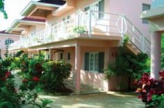 This beachfront accommodation option is a great choice for everyone visiting the amazing island of Jamaica. The excellently equipped and tastefully furnished villas are ideally located around a 90-minute drive from Donald Sangster International Airport and just a few steps from Negril's town centre with a myriad of entertainment and dining options. All the private villas are tastefully appointed to ensure its guests enjoy a pleasant stay. They come fully equipped with modern amenities such as air-conditioning and some of them also feature a private kitchenette for those who may wish to prepare their own food. Among the in-room facilities, visitors may really appreciate the private balcony where they can bask in the sun and relax at the end of the day. Guests can enjoy the international and local specialities served at the on-site restaurant or unwind at the swim-up pool bar.
