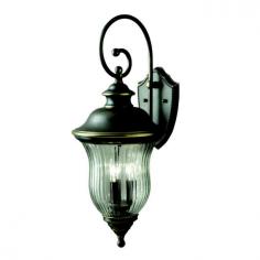 Transitional-style wall light. Aluminum construction with olde bronze finish. Clear ribbed optic glass wall lantern. Accommodates (3) 60W candelabra bulbs (not included). Overall dimensions: 13.5L x 11W x 28H inches. An elegant arm and softly contoured shade highlights the traditional European influence of the Kichler Sausalito 9492OZ Outdoor Wall Lantern - 11 in. - Olde Bronze. Its rich finish and clear ribbed optic glass shade further enhances its antique appeal. You can use it to illuminate your outdoor seating, porch, balcony or terrace. Three-bulb capacity enables it perfect for shedding a bright glow. Apart from this, tough aluminum construction makes it durable. Kichler QualitySince 1938, Cleveland-based Kichler Lighting has been known for their innovative designs and excellent craftsmanship. Kichler is the world's leading decorative lighting fixture company and the winner of four ARTS Lighting Manufacturer of the Year awards. Kichler designers travel the world to discover the latest trends in exterior and interior style, colors, and designs. They then translate the best of those trends into fixtures that will bring beauty, pleasure, and light into your home. Kichler fixtures stand the test of time and are functional works of art that you're sure to treasure.