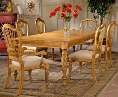This classic dining table conjures images of a wealthy southern home enjoying a spread of perfectly prepared food. Antique pine finish and carved solid wood pilasters give this table an antique delicacy, with beautiful modern finishing. Inner leaf is removable to fit the family perfectly for dinner, and then expand for entertaining. Complete your dining room with this elegant dining table. The antique pine finish lends a sense of quality and taste to your dinner experience, and the extra leaf allows friends and family to experience the quality and taste for themselves every time they visit. For residential use. Give your dining room the look of an antique heirloom piece with this stunning dining room table. The table is finished in an antique pine color and features a leaf to allow you to expand it when you have company. The legs features delicate details to add prestige to this piece. Rectangle dining table w leaf. Antique pine finish. Leaf Closed: 30H x 72W x 44D. Leaf Open 24": 30H x 96W x 44D.