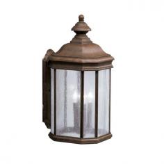 Traditional-style design. Aluminum construction in a variety of finishes. Clear-seedy glass panel. Accommodates (1) 100W medium base bulb (not included). Available in variety of sizes. The Kichler Kirkwood 90 Outdoor Wall Lantern, with its transitional design, blends well with traditional as well as modern decors. Featuring cast aluminum construction, this lantern is built to last for many years. Its body displays beautiful moldings that give it an irresistible vintage appeal. Apart from this, seedy glass diffuser further adds to its appearance and utility. You can effectively use this lighting fixture to light up your porch, terrace, balcony or doorway. Kichler QualitySince 1938, Cleveland-based Kichler Lighting has been known for their innovative designs and excellent craftsmanship. Kichler is the world's leading decorative lighting fixture company and the winner of four ARTS Lighting Manufacturer of the Year awards. Kichler designers travel the world to discover the latest trends in exterior and interior style, colors, and designs. They then translate the best of those trends into fixtures that will bring beauty, pleasure, and light into your home. Kichler fixtures stand the test of time and are functional works of art that you're sure to treasure. Size: 9.75 in. Color: Tannery Bronze.