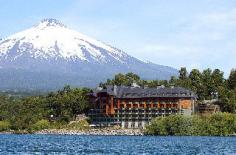 This luxury hotel is located in the Ninth Region of Chile, the Araucania region. Nearby attractions include fly fishing and Casino Enjoy Pucòn (both 15 minutes' drive), Villarica Volcano (25 minutes by car) and Caburga Lake (around 35 minutes' drive). Two domestic airlines offer daily direct flights to Temuco from Santiago Airport (approximately 1 hour flight time). The distance from the hotel to the airport is around 90km. This spacious and elegant design hotel is filled with opulence and has spectacular views of Lake Villarica's clear waters. Anyone visiting the area will fall in love with the snow-capped volcanoes in winter, and the region is thought to offer the best nature in Chile in an incomparable atmosphere. The family-friendly city hotel offers 70 guest rooms in total and facilities include a lobby with hotel safe and lift access, wireless Internet access, and a laundry service (fees apply). Guests arriving at the charming business hotel by car may leave their vehicle in the garage. The design features pay homage to the surroundings and offer a unique opportunity for travellers to really experience Chilean culture. All rooms are equipped with air conditioning and central heating, satellite TV, an en suite bathroom with separate bathtub and shower, a hairdryer, safe, and fax and Internet access via modem. They are all spacious and luxuriously decorated, providing all that guests need for the perfect holiday. A double or king-size bed, a direct dial telephone, radio, hi-fi, ironing set, washing machine and kitchen with fridge, cooker, microwave and tea and coffee making facilities also feature in all rooms as standard. Guests may also enjoy the view from their private balcony or terrace.
