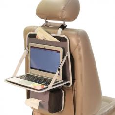 FH Group E-Z travel collapsible tray with tissue dispenser is made of heavy duty and waterproof oxford fabric that offers great durability. Multi-functional product that combines storage and table into one; instantly transforms your car interior into a space for work, reading, writing or other leisure activities; ideal for both adults and children. A perfect item for keeping your interior organized and making long road trips more convenient and enjoyable. Color options: Gray Black Material: Heavy-duty and waterproof Oxford fabric, material is breathable. Cleaning tip: Washable Dimensions: 13 x 14.5 x 0.5 inch Product features Large pocket at the top to store magazine and books, extra mesh pocket at the bottom for maps and books. Easy collapsible tray design with adjustable straps artfully utilizes limited interior space and turns into a tray for laptop, food, books, cards, games and other items. Conveniently flattens and closes with velcro when not in use. Extra feature - useful tissue dispenser attaches to the to the bottom for convenient access. Adjustable straps with quick-detach buckles; universally designed for most vehicles.