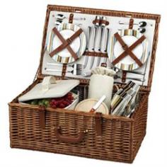 The Dorset English style picnic basket for four is made to last with quality construction and stylish details. Beautifully hand crafted using full reed willow, each basket includes ceramic plates, glass wine glasses, and the highest quality accessories. Includes: (4) ceramic plates, glass wine glasses, stainless flatware, cotton napkins, (1) food cooler, insulated wine pouch, hardwood cutting board, spill proof salt & pepper shakers, wood handle cheese knife, and stainless waiters corkscrew. Natural Willow with leather handle, closures and hinge covers. Limited Warranty. Dimensions: 15" L x 15" W x 9" H Weight: 8 lbs.