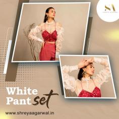 Discover the epitome of elegance and versatility with our stunning collection of white pant sets at Shreya Agarwal. Whether it's a formal event or a casual outing, our white pant sets are the perfect choice for a chic and timeless look. Crafted with precision and attention to detail, these sets offer you unmatched comfort and style. Explore our curated range now and make a statement with our white pant sets. Shop today at Shreya Agarwal and redefine your fashion game with sophistication.

