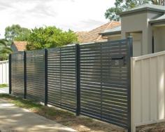 In addition to offering modern style and functionality, our aluminium slat gates in Adelaide can be fully customised in a range of colours to perfectly complement your existing exterior décor. Commonly used for both pedestrian and vehicle access, aluminium slat gates provide a sleek and practical solution while also enhancing the overall appearance of your property. For an even more striking finish, these gates can be paired with complementary fencing features such as sandstone pillars, creating a sophisticated and contemporary outdoor design. Durable, low-maintenance, and visually appealing, our custom aluminium slat gates are the perfect way to enhance the security and curb appeal of your home.
